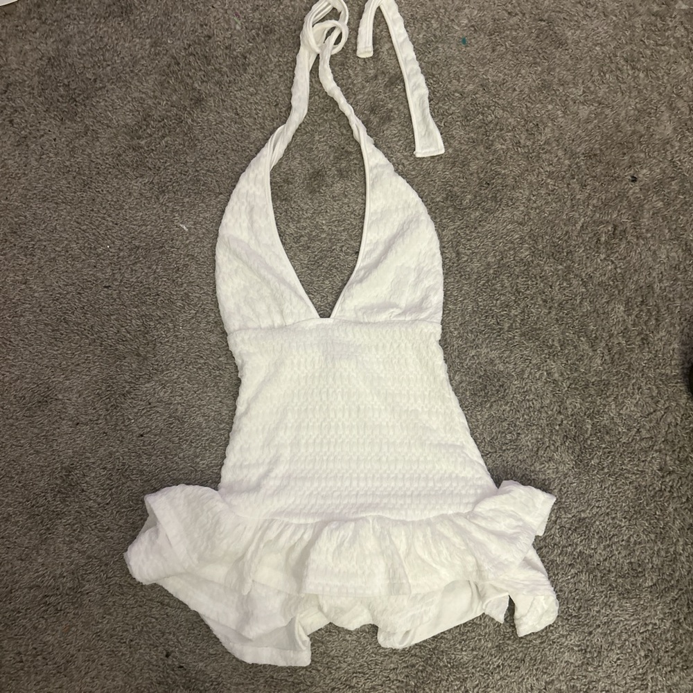 White halter top romper with mini skirt